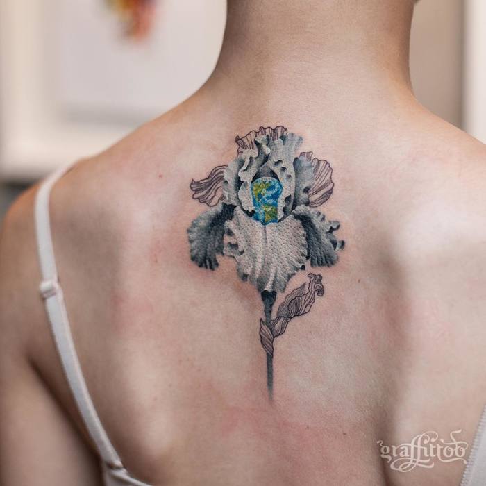 Iris Holding Earth by graffittoo