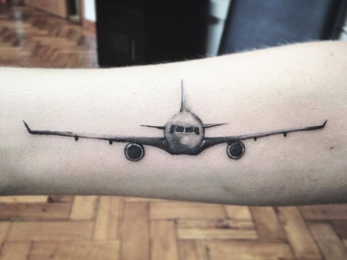 Black and Grey Airplane Tattoo by annacheukian