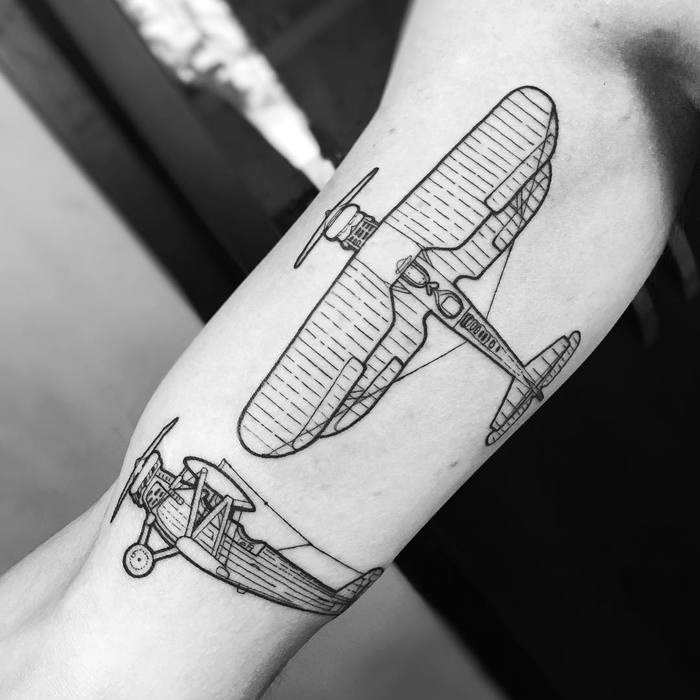 Blackwork Biplane Tattoo by tattoosbysantiago