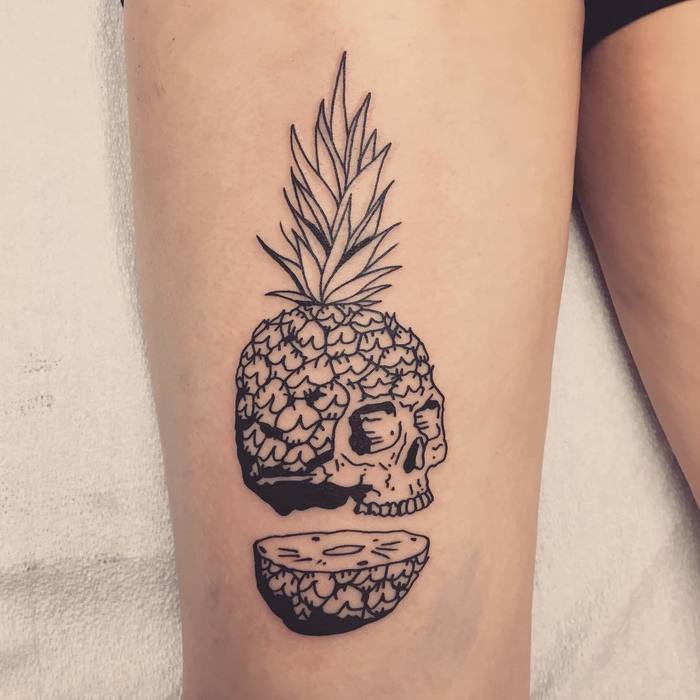 Sliced Pineapple Skull Tattoo by rozlyndubztattoos