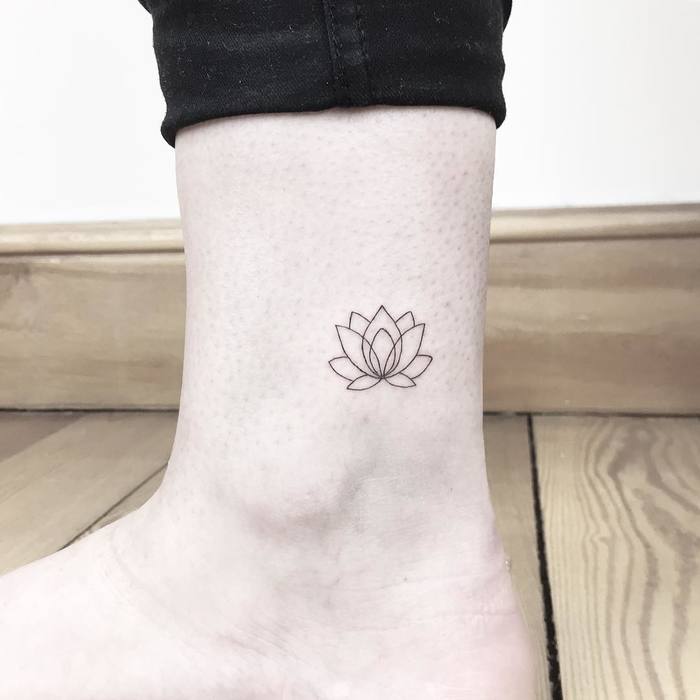 Minimalist Lotus Flower Tattoo by Cagri Durmaz