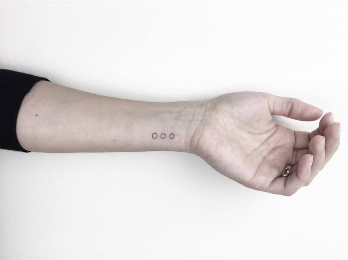 Minimalist Tattoo on Wrist by Cagri Durmaz