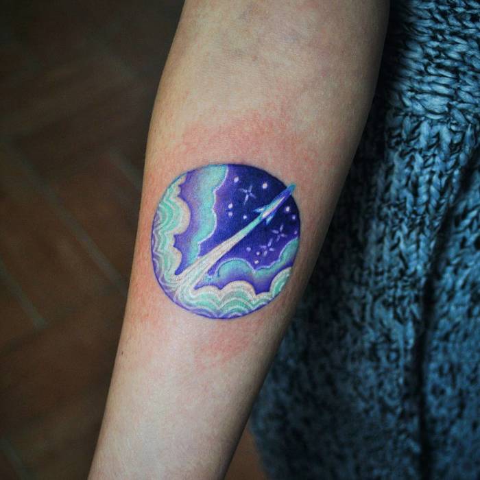 Blue Ink Rocket Tattoo by valeriatattooing