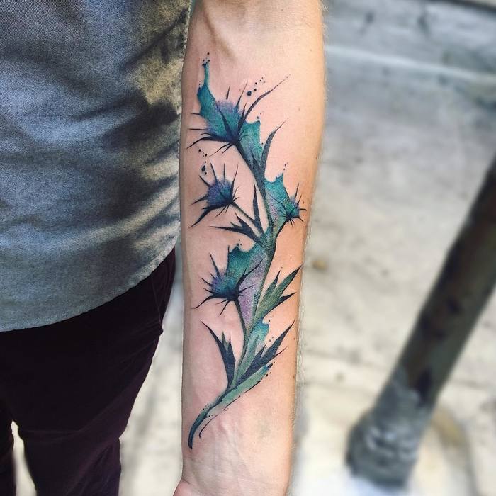 Watercolor Thistle Tattoo by tattoojune