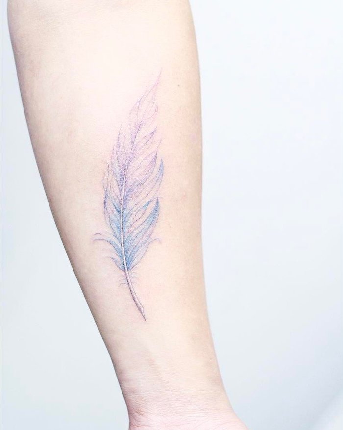 Soft Feather Tattoo on Inner Forearm