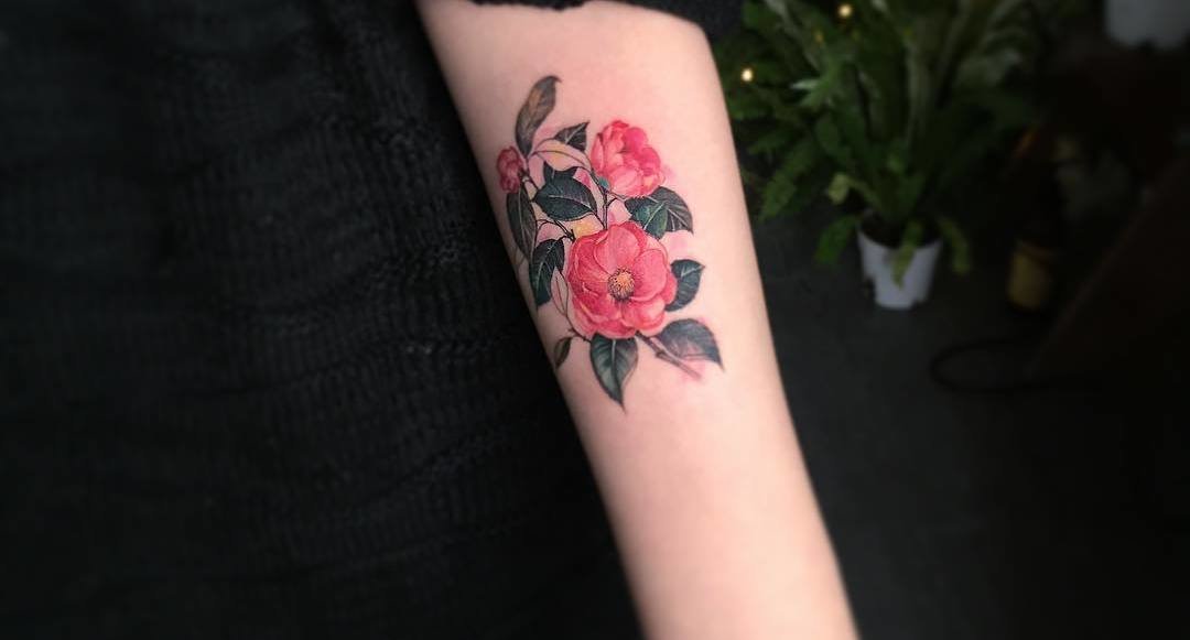 24 Beautiful and Elegant Camellia Tattoo Designs